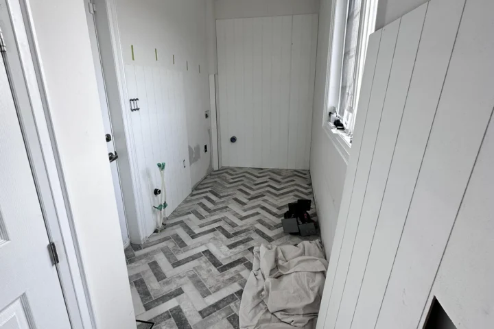 Finished laundry room doorway and patterned floor