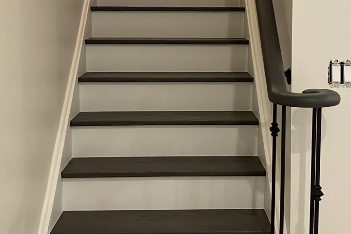 Finished staircase with dark treads and white risers